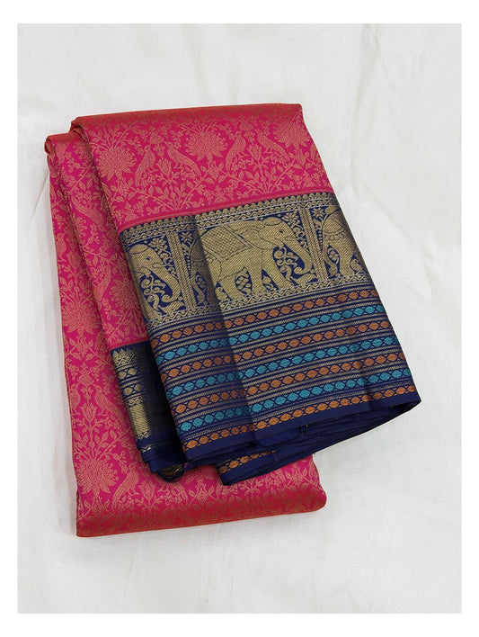 Pink handwoven Kanchipuram silk saree folded with navy elephant border and multicolour stripe detailing
