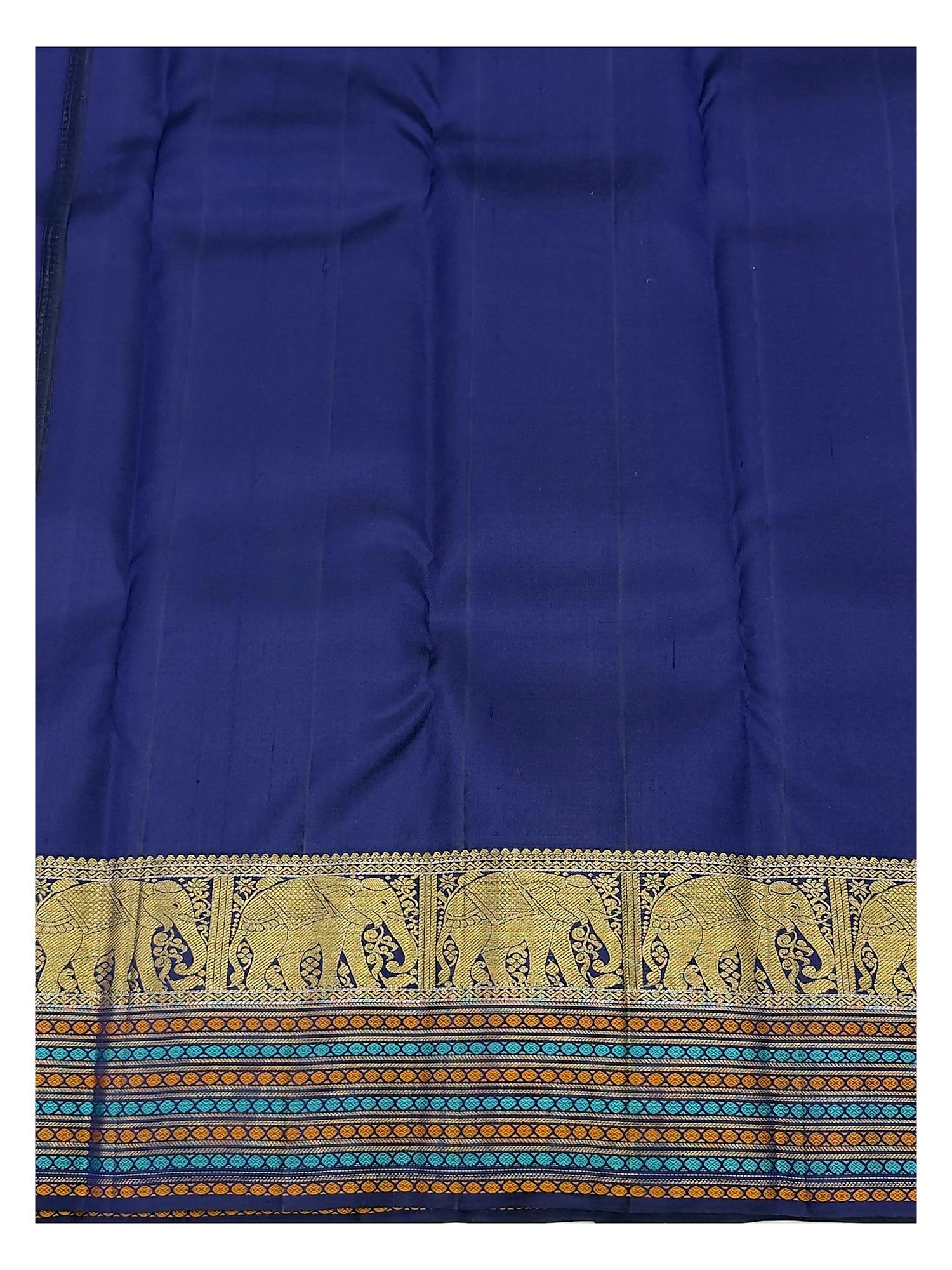 Close view of the navy contrast pallu and elephant zari border of the handwoven Kanchipuram silk saree