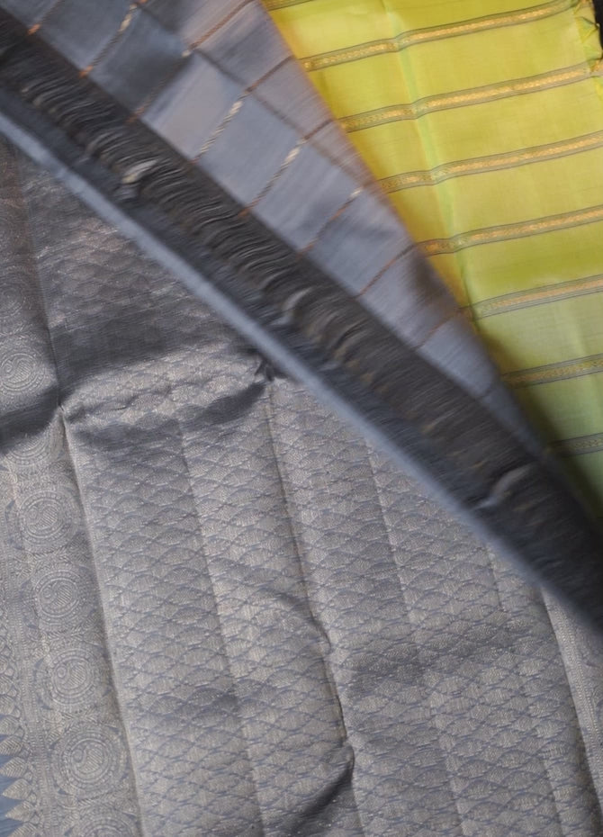 Apple Green Saree with Contrast Grey Border, Bhel Dhari Weave, Poo Chakram & Annapakshi Butta, and Mayil Motif Accents