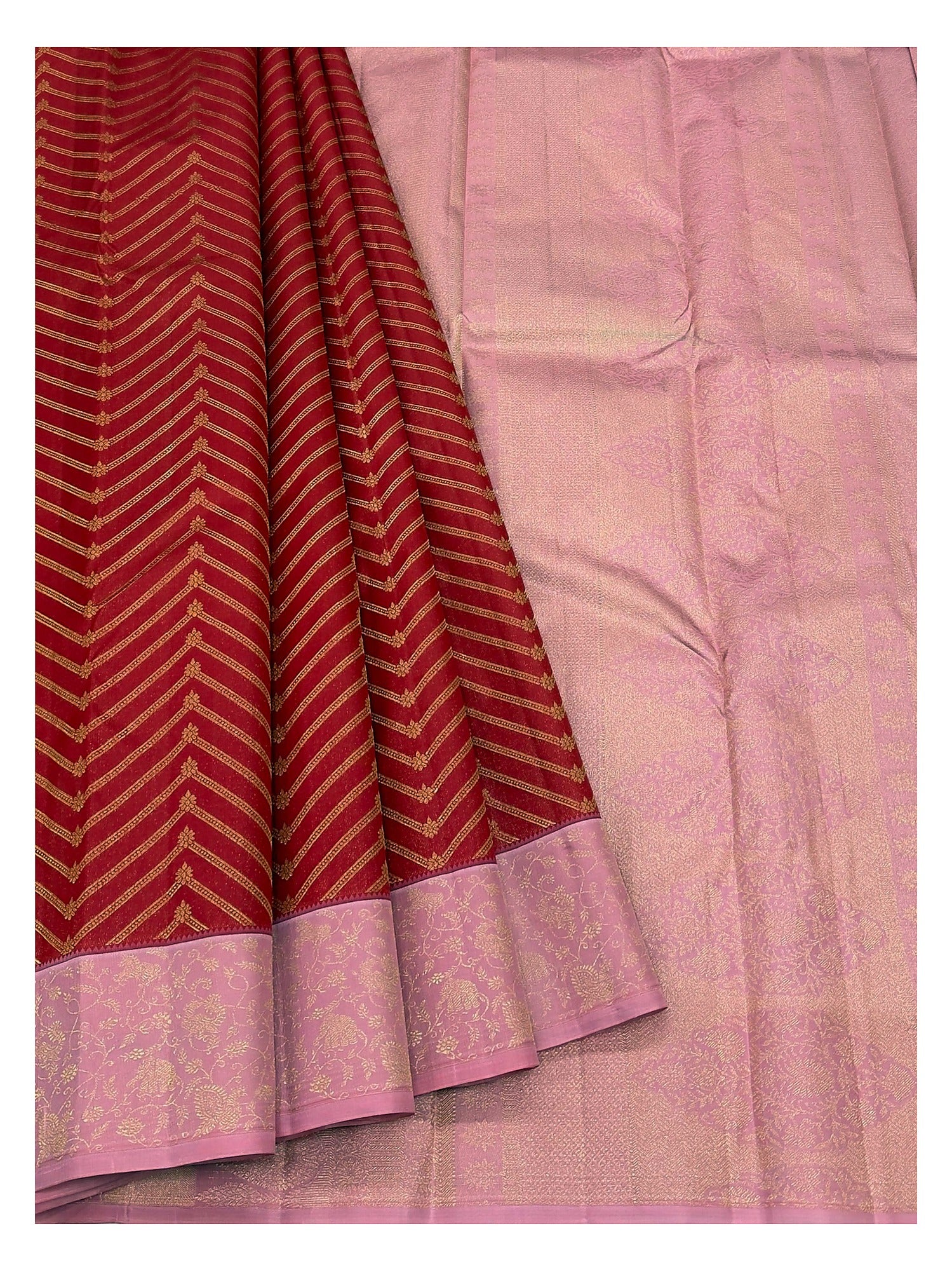 Red pure silk saree with pink floral border and matching pink pallu spread open