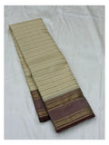 Cream pure silk saree with fine woven stripes and mauve contrast border
