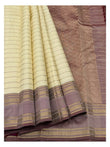 Pure silk saree drape showing cream body, mauve border, and woven pallu