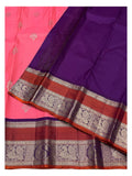 Deep purple pallu and peacock panel border on bright pink pure silk saree