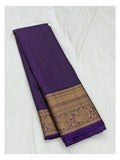 Royal purple pure silk saree with gold zari border shown unfolded