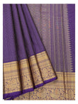 Royal purple pure silk saree showing gold zari border and pallu detailing