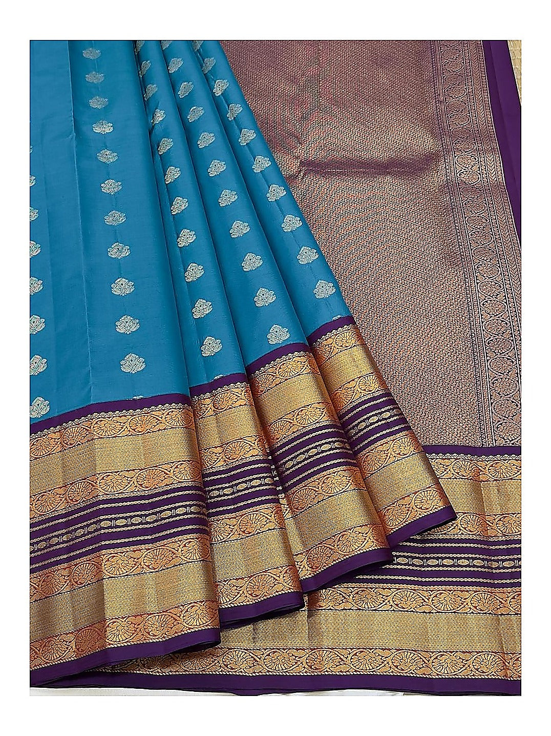 Pure Silk Saree - Draped view showing teal body and rich woven pallu