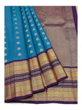 Pure Silk Saree - Draped view showing teal body and rich woven pallu