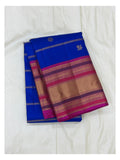Royal Blue Pure Silk Saree With Peacock Buttas And Magenta Zari Border front view
