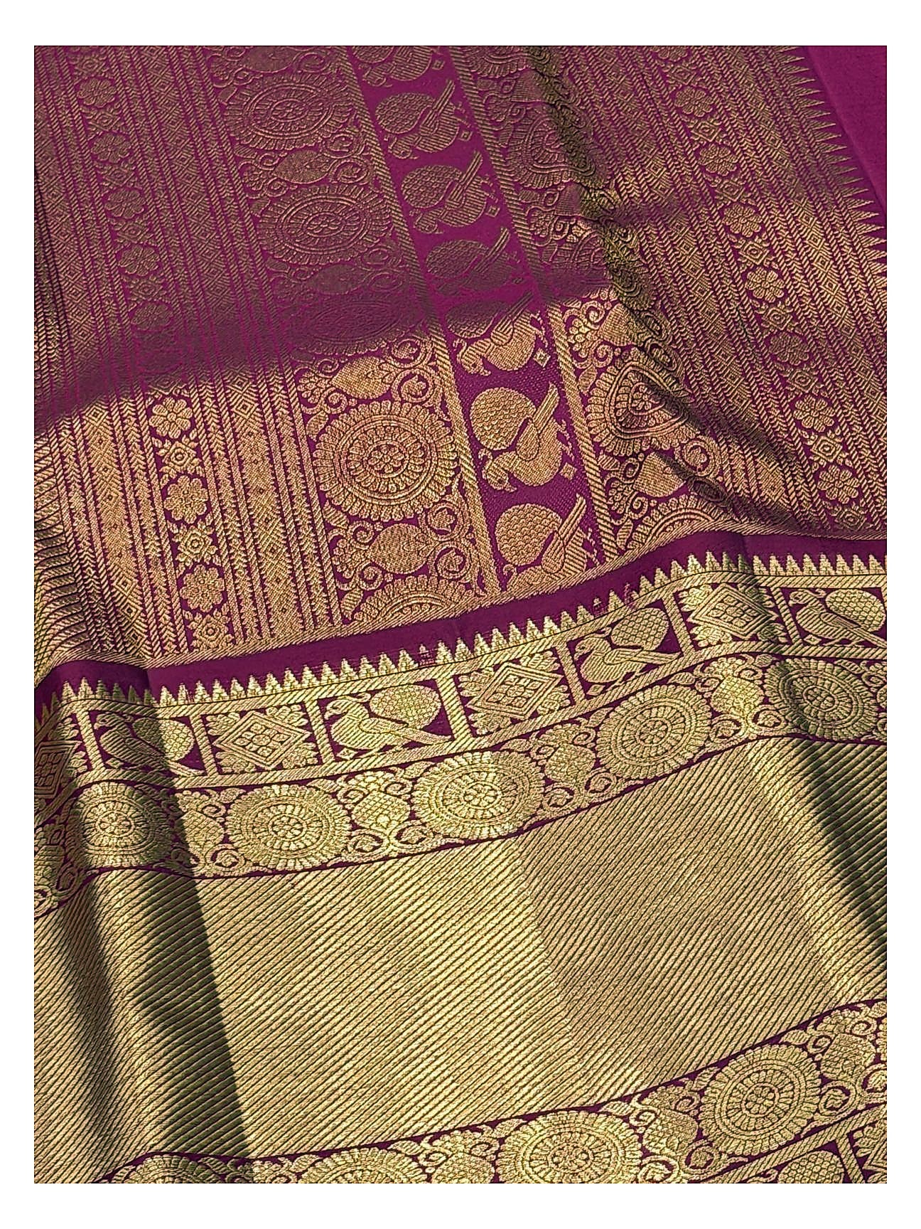 Soft Ivory Handwoven Kanchipuram Silk Saree with Floral Vine Weave and Magenta Elephant Zari Border