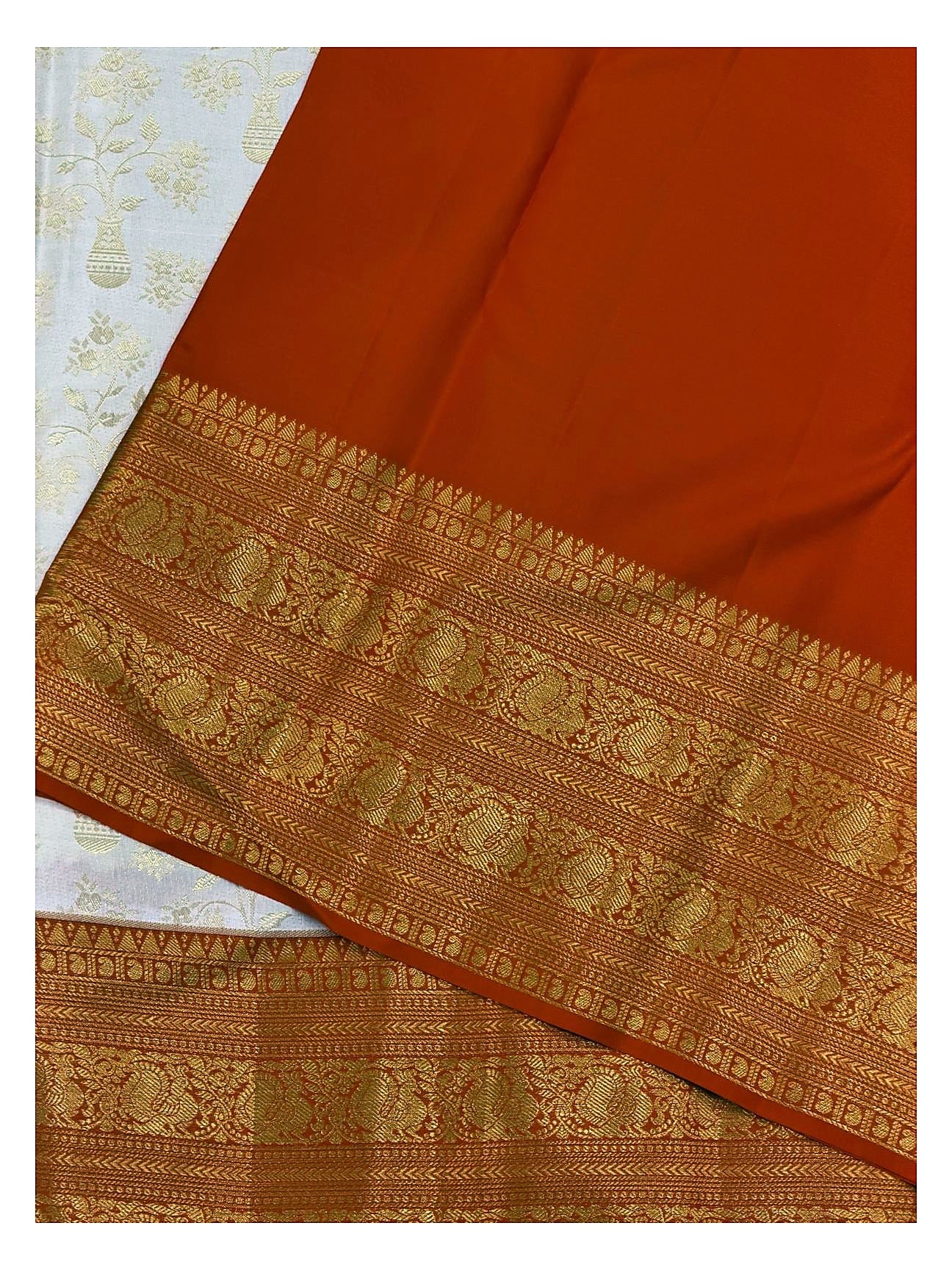 Soft Ivory Handwoven Kanchipuram Silk Saree with Gold Floral Vine Motifs and Broad Orange Gold Zari Border front view