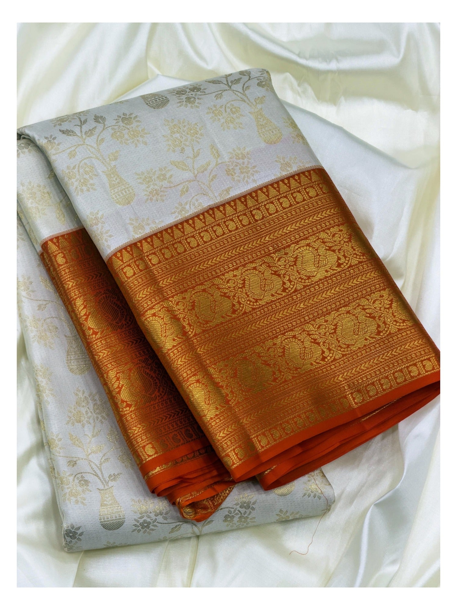 Soft Ivory Handwoven Kanchipuram Silk Saree with Gold Floral Vine Motifs and Broad Orange Gold Zari Border