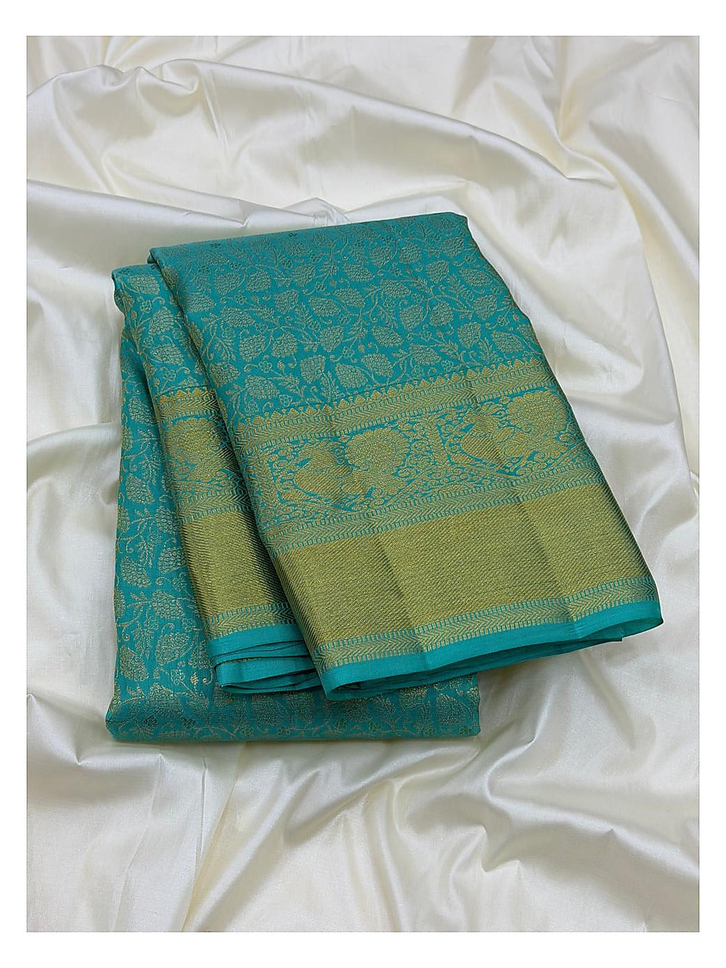 Turquoise Blue Handwoven Kanchipuram Silk Saree with Gold Floral Vine Weave and Peacock Zari Border
