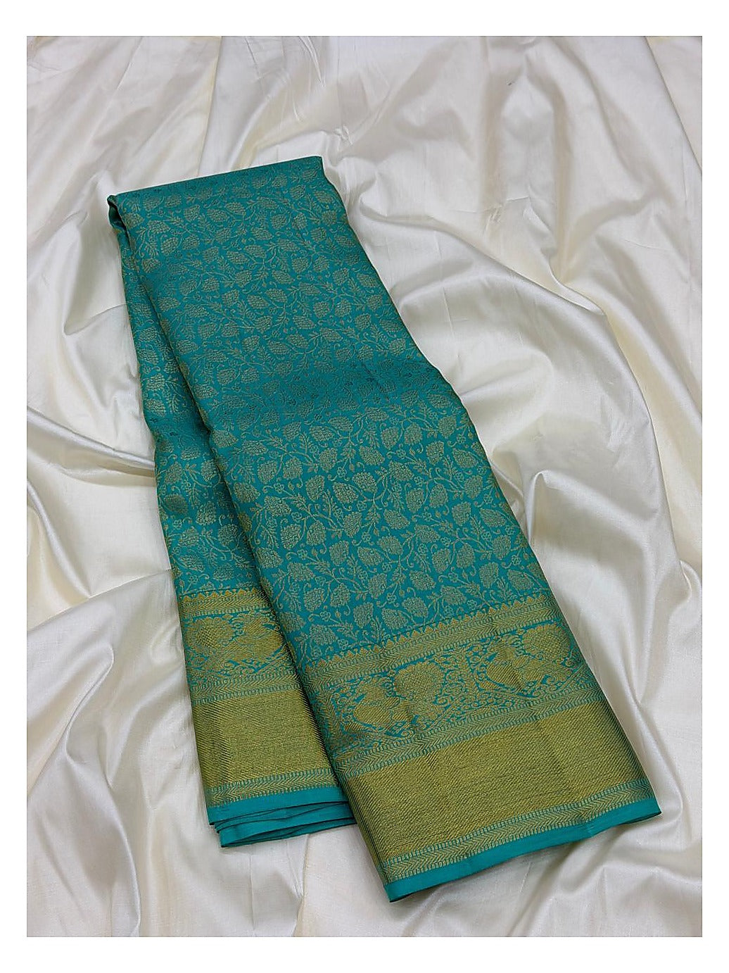 Turquoise Blue Handwoven Kanchipuram Silk Saree with Gold Floral Vine Weave and Peacock Zari Border