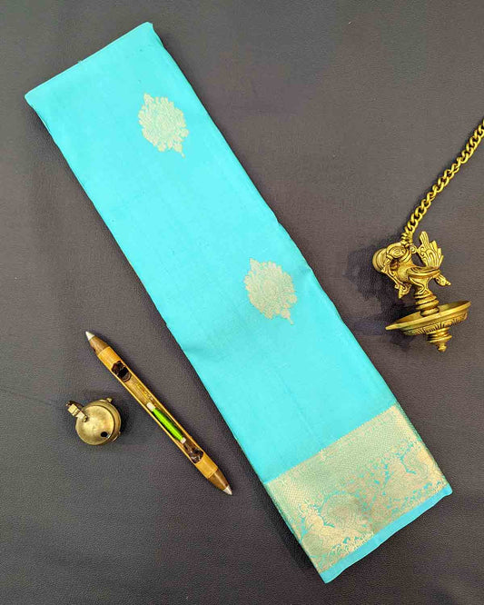 Traditional Kancheepuram silk saree with blue paisley motif