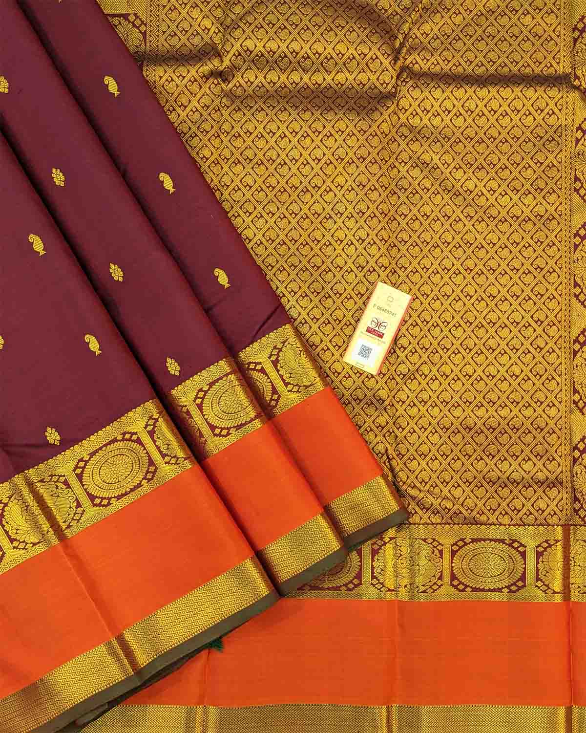 Dark red and orange silk saree with Annam Border, featuring gold