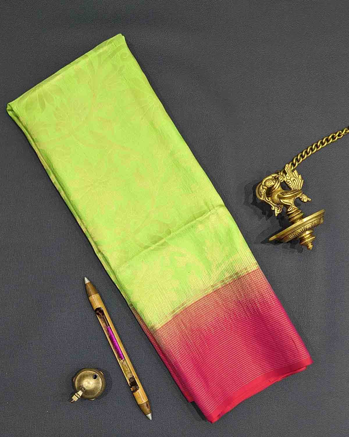 Lively green Kanchipuram soft silk sarees with vine buttas and frugal pallu.