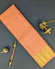 Pastel Peach Traditional Saree with Dark Green Decorated Pallu