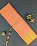Pastel Peach Traditional Saree with Dark Green Decorated Pallu