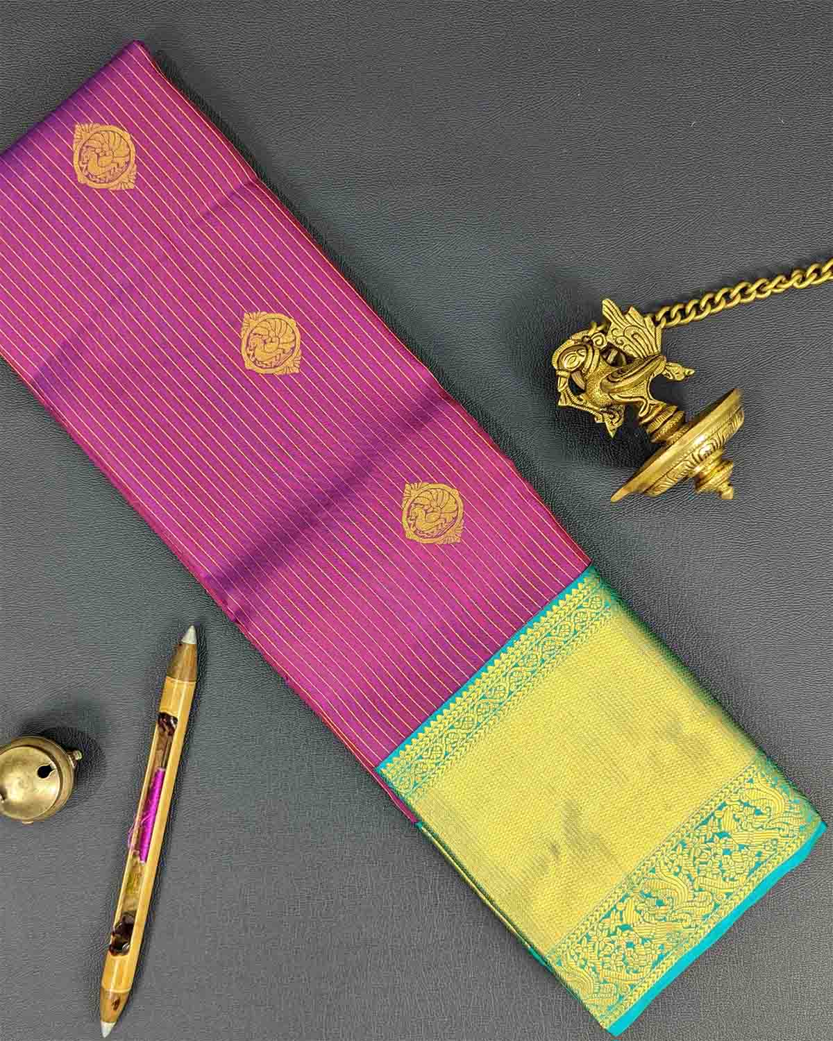 Extravagant Saree with Striped Annam Buttas and Decorated Pallu