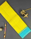 Yellow Kancheepuram Silk Sarees with leaf buttas, traditional and elegant