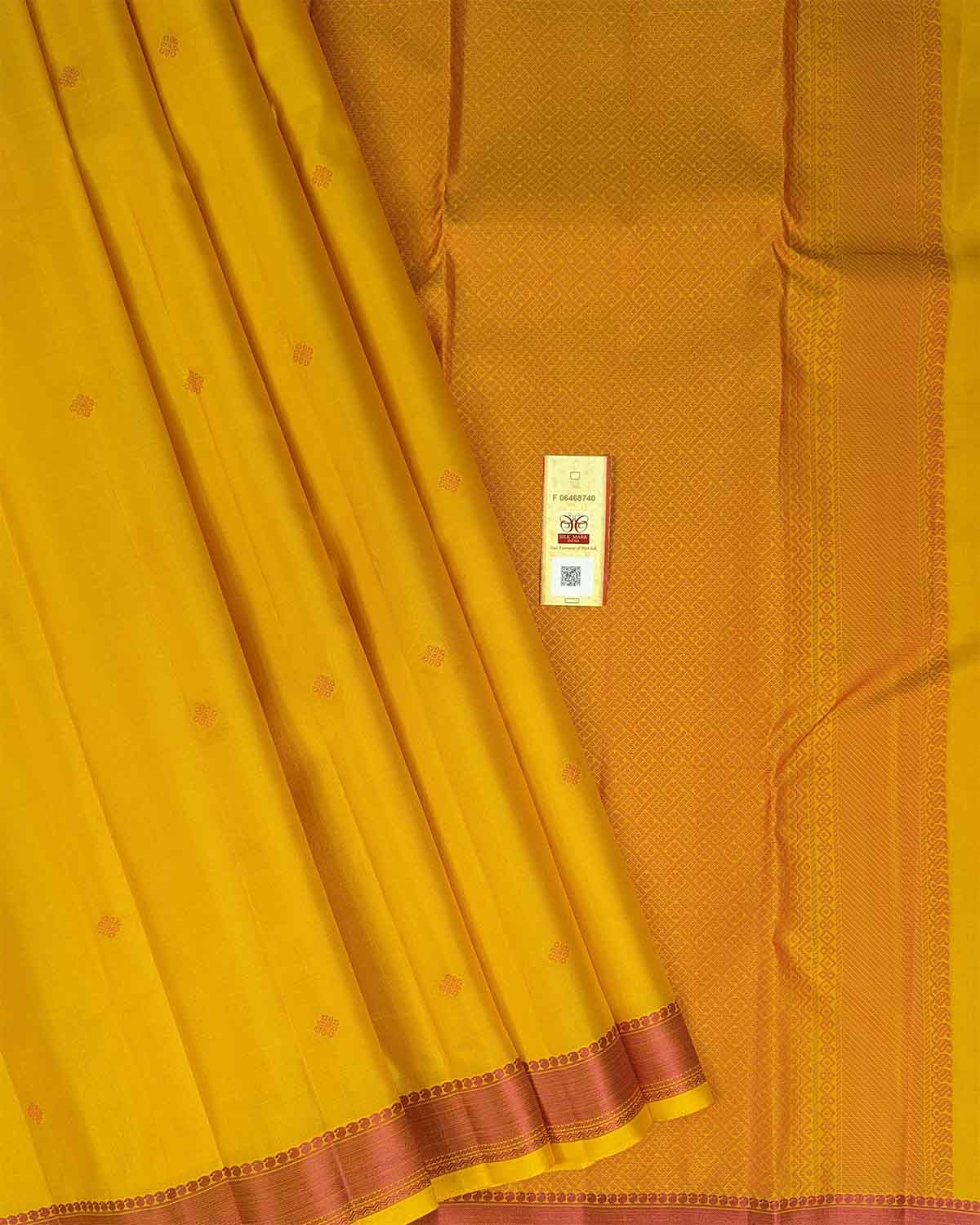 Sunset Yellow Kamalam Zari Buttas and Diamond Decorated Pallu
