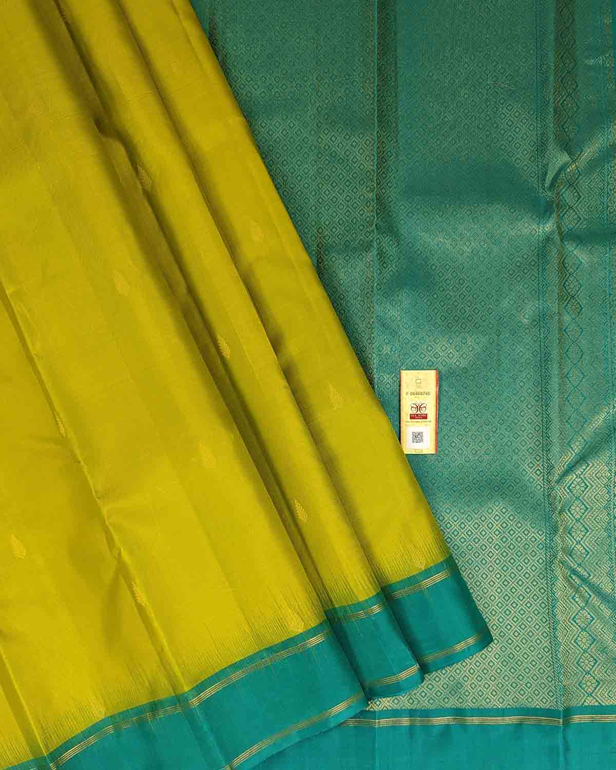 Yellow Kancheepuram Silk Sarees with leaf buttas, traditional and elegant