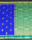 Blue Traditionally Kancheepuram Silk Sarees With Paisley Buttas And Ornate Pallu Green Border