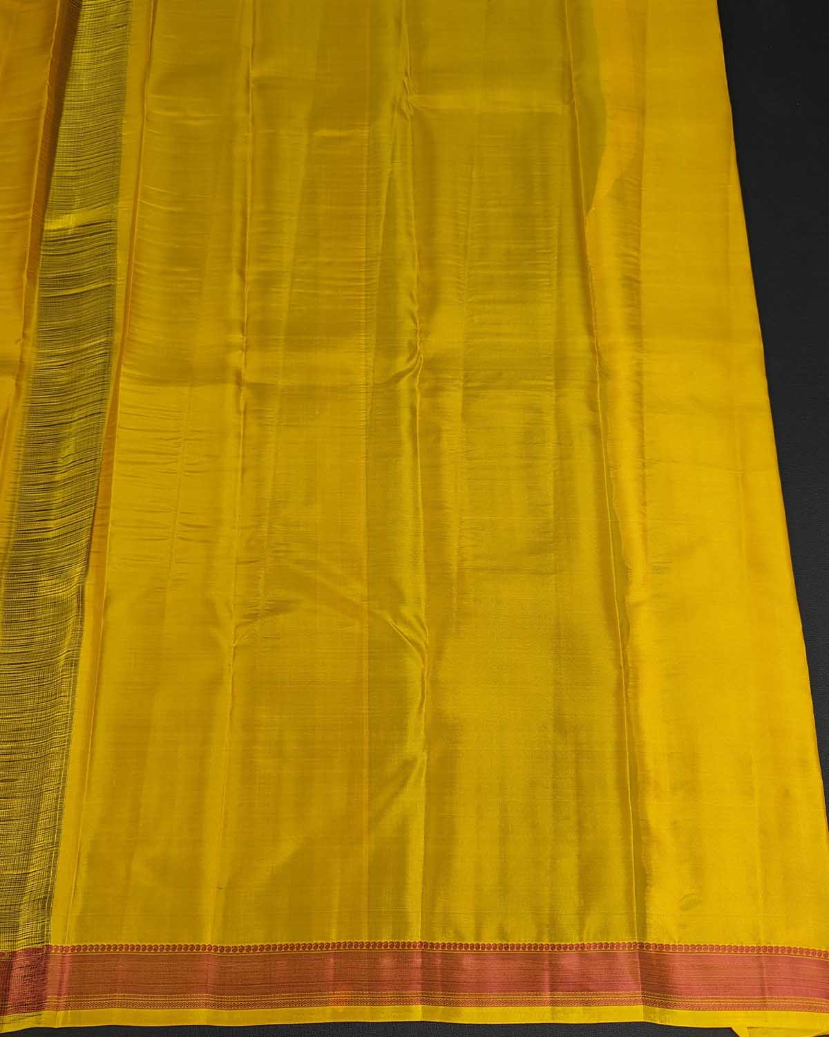 Sunset Yellow Kamalam Zari Buttas and Diamond Decorated Pallu