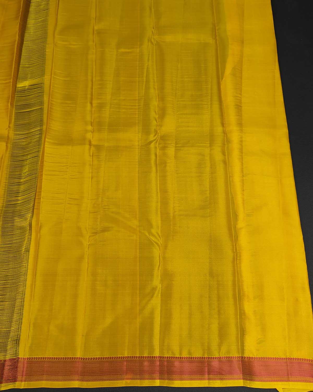 Sunset Yellow Kamalam Zari Buttas and Diamond Decorated Pallu