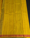 Sunset Yellow Kamalam Zari Buttas and Diamond Decorated Pallu