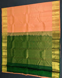 Pastel Peach Traditional Saree with Dark Green Decorated Pallu