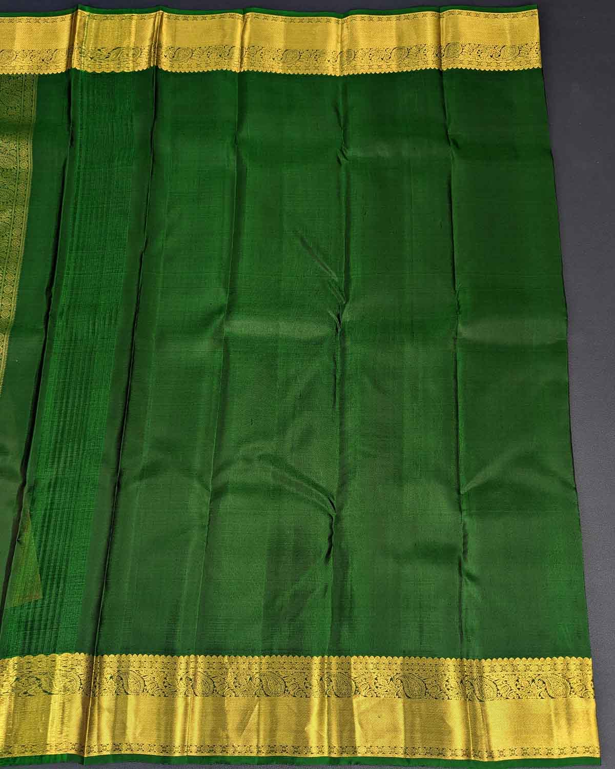 Pastel Peach Traditional Saree with Dark Green Decorated Pallu
