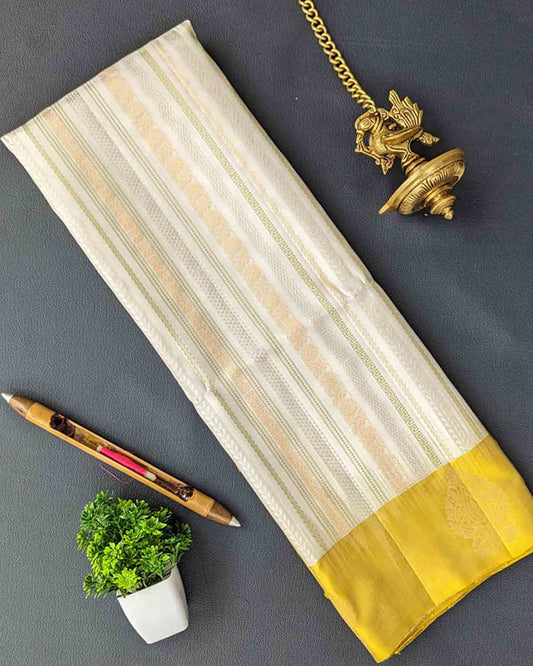 Pastel beige Kanchipuram silk sarees with striped body and paisley zari border