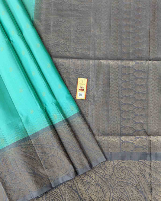 Elegant blue Kanchipuram soft silk saree featuring Annapakshi buttas and ash border