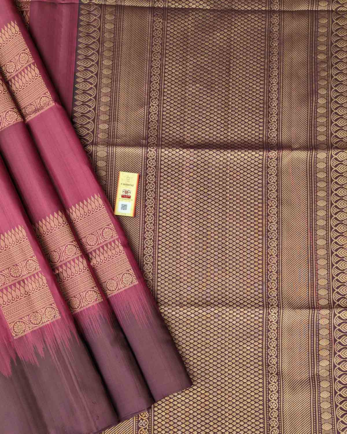 Elegant purple Kanchipuram silk saree with soft border and square buttas